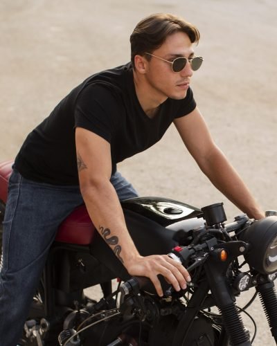 high-angle-man-with-old-motorcycle